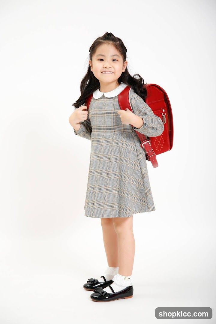 Young Girl with Red Backpack
