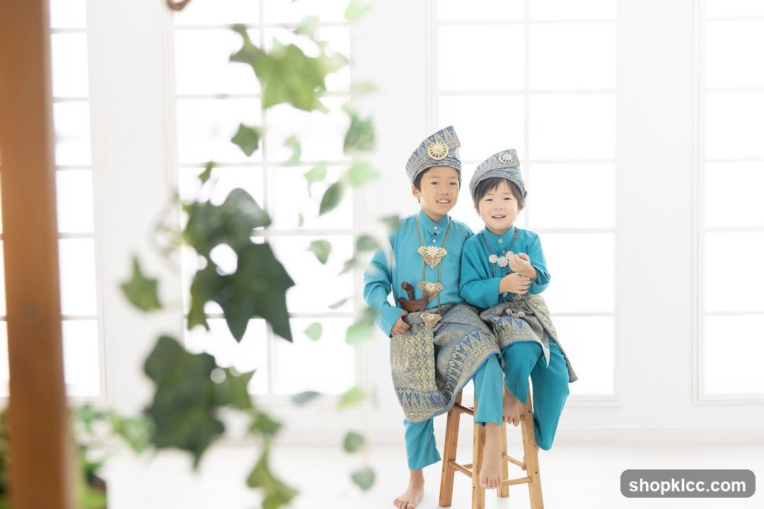 Two boys in traditional attire