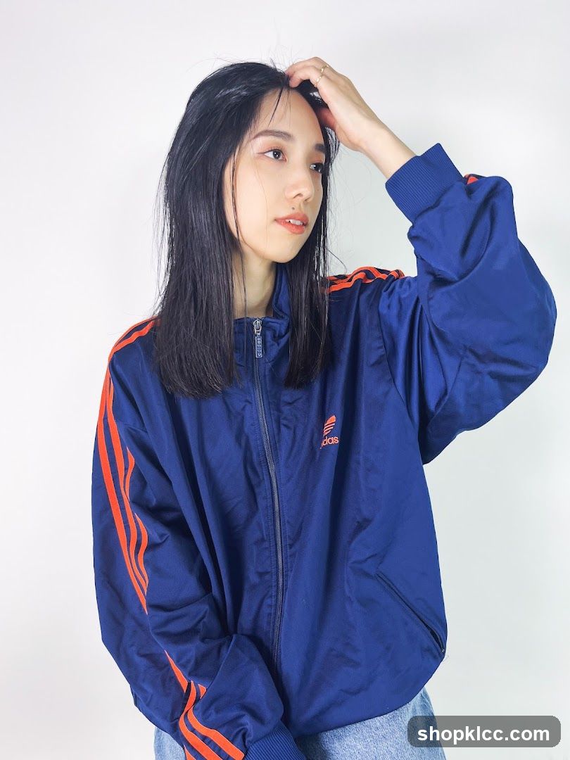 Woman in Adidas Track Jacket