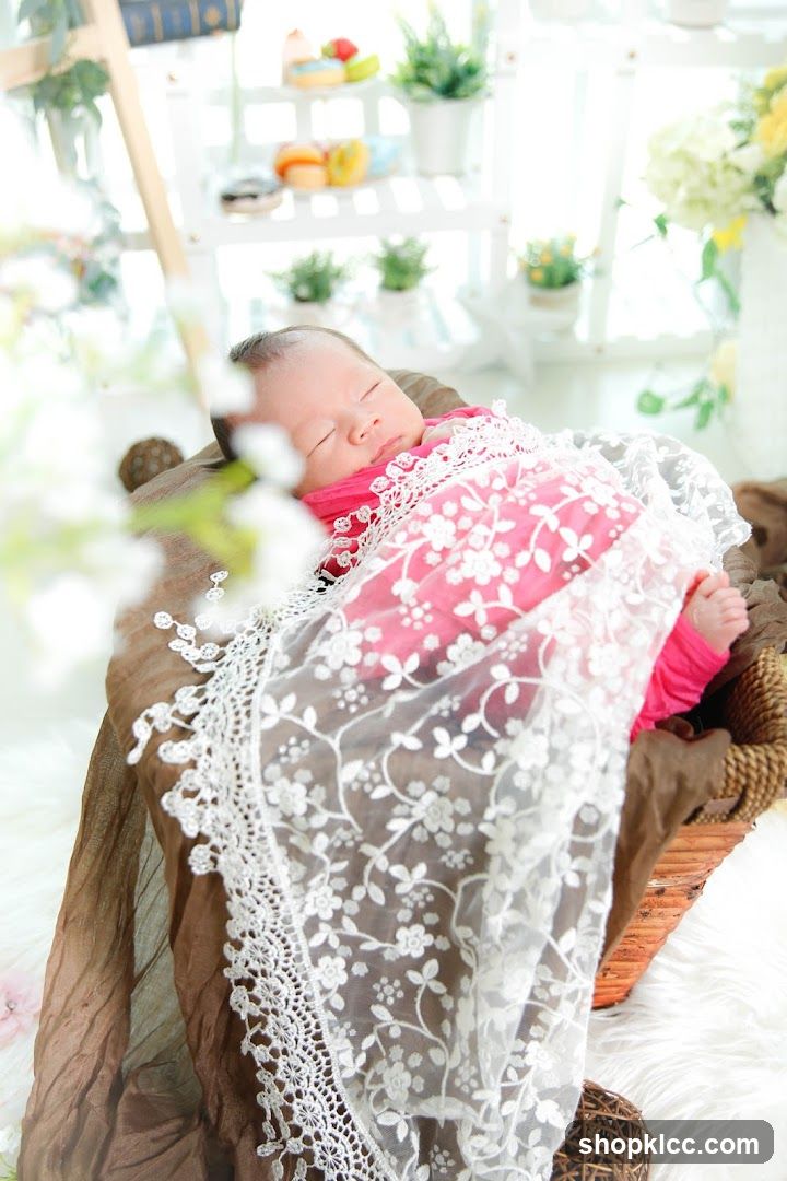 Newborn baby sleeping in a basket