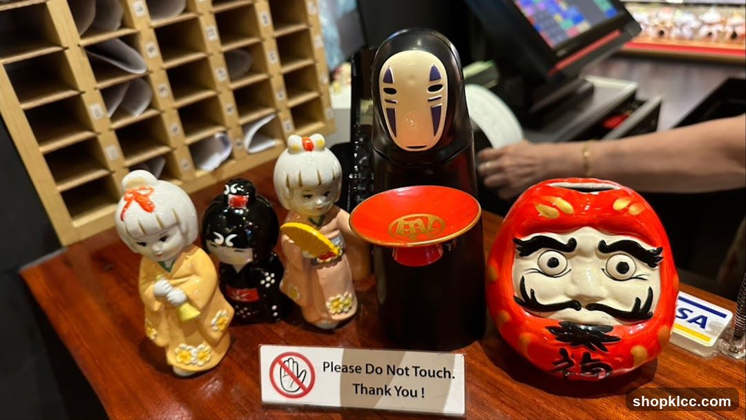 Decorative Figurines and Cash Register
