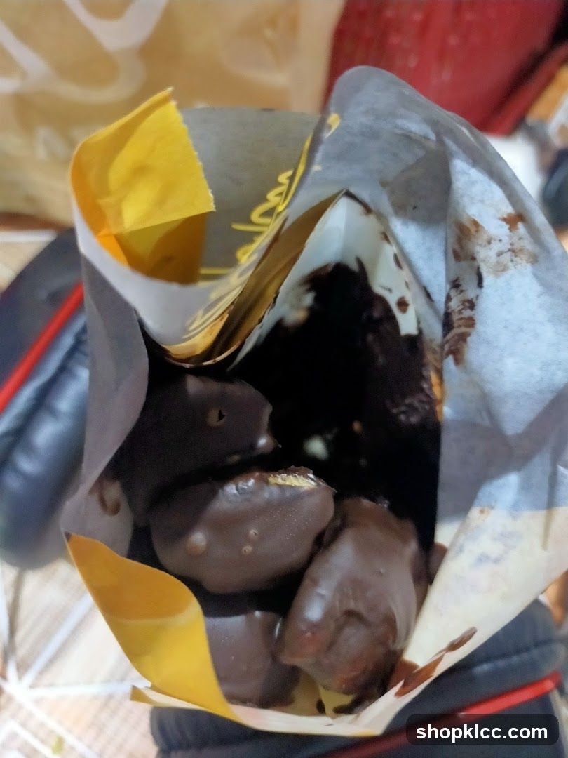 Chocolate-covered treats in a paper bag