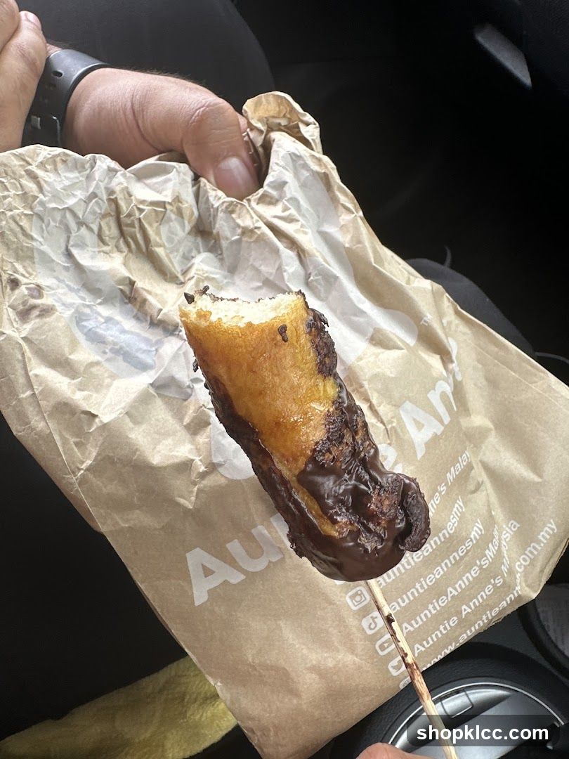 Chocolate-dipped snack on a stick