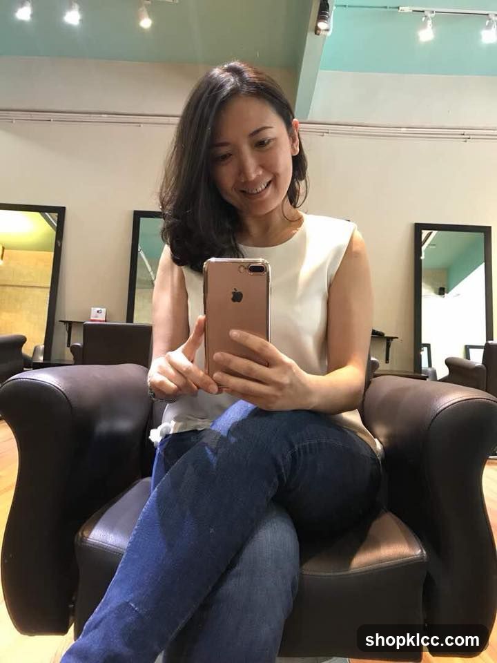 Woman Taking Selfie in Salon