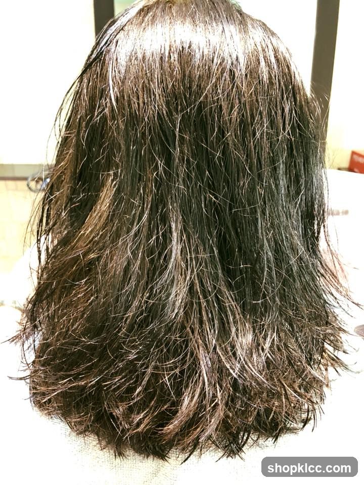 Back of a person with long, dark hair