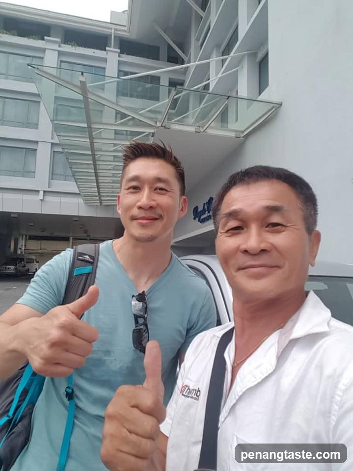 Two Men Giving Thumbs Up
