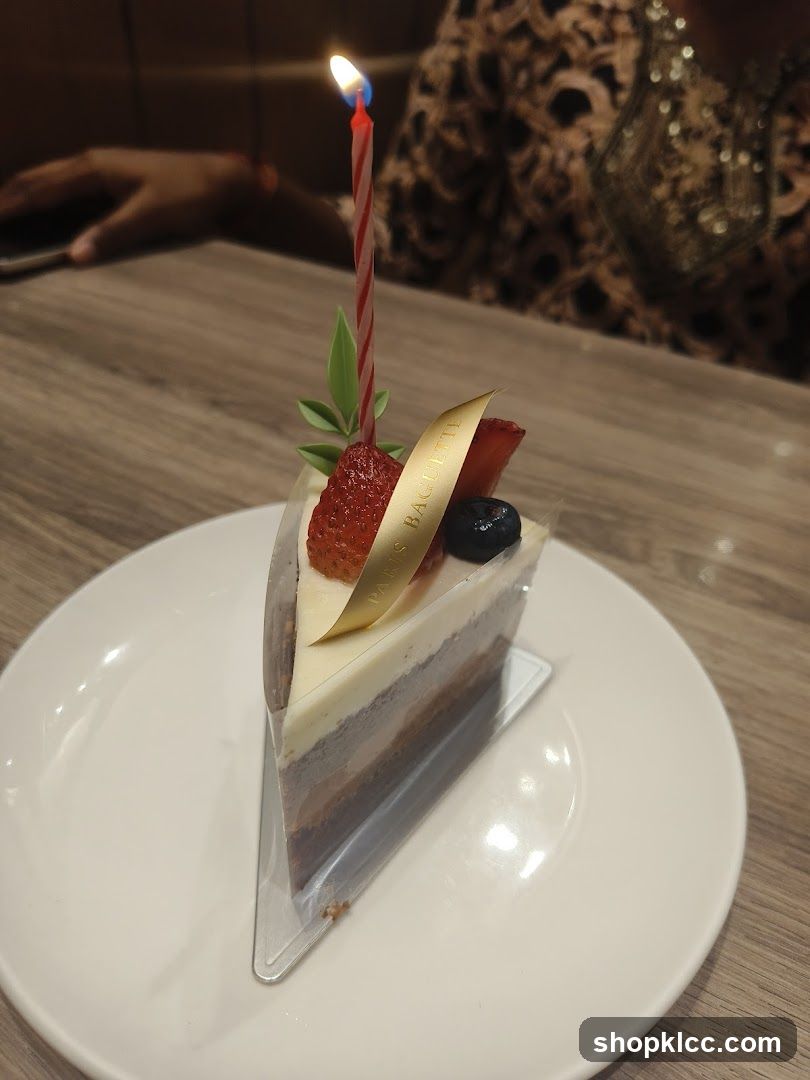 Slice of cake with a candle