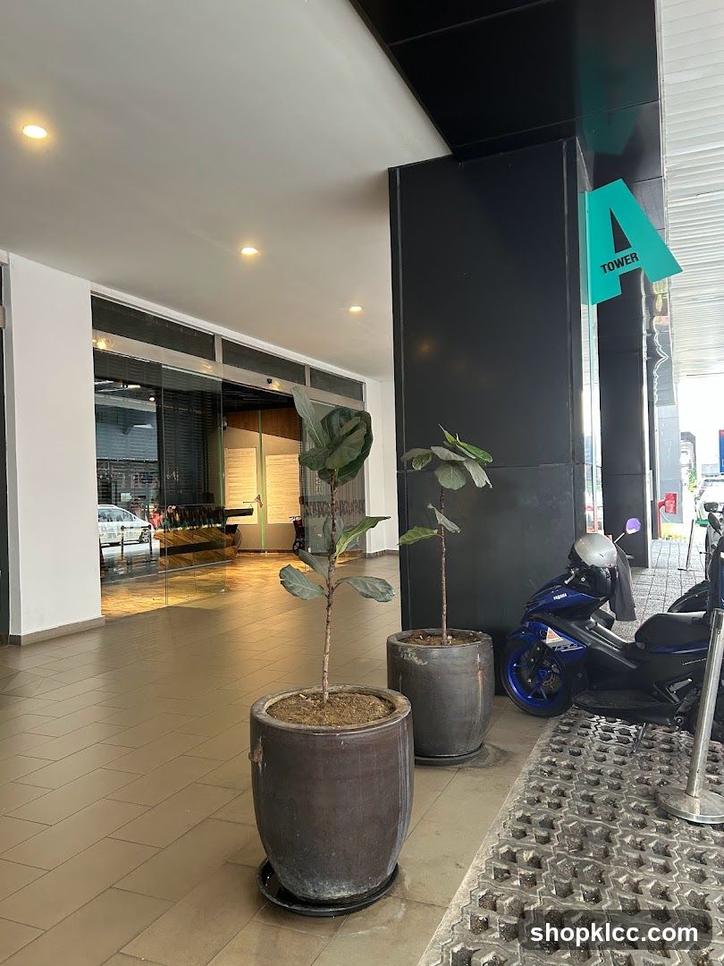 Building Entrance with Plants and Motorcycle