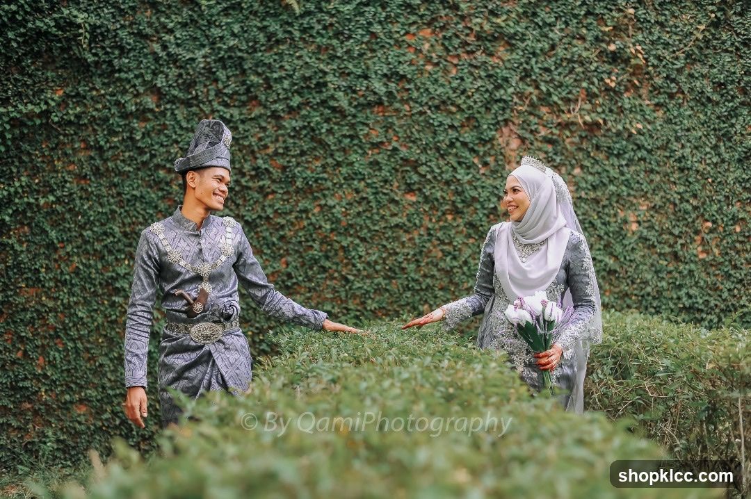 Wedding Couple Posing Outdoors
