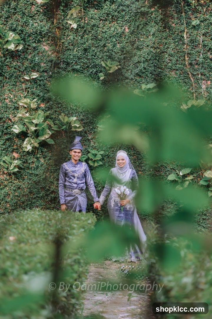 Wedding Couple Posing in Garden