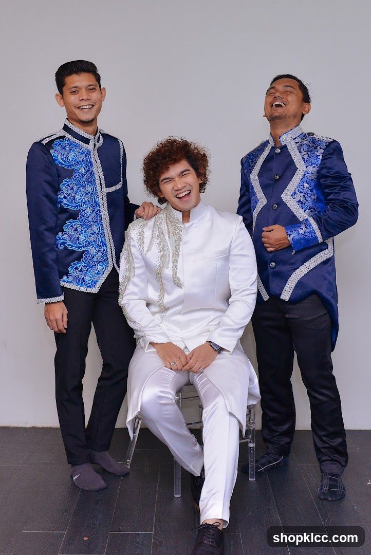 Three men in formal attire