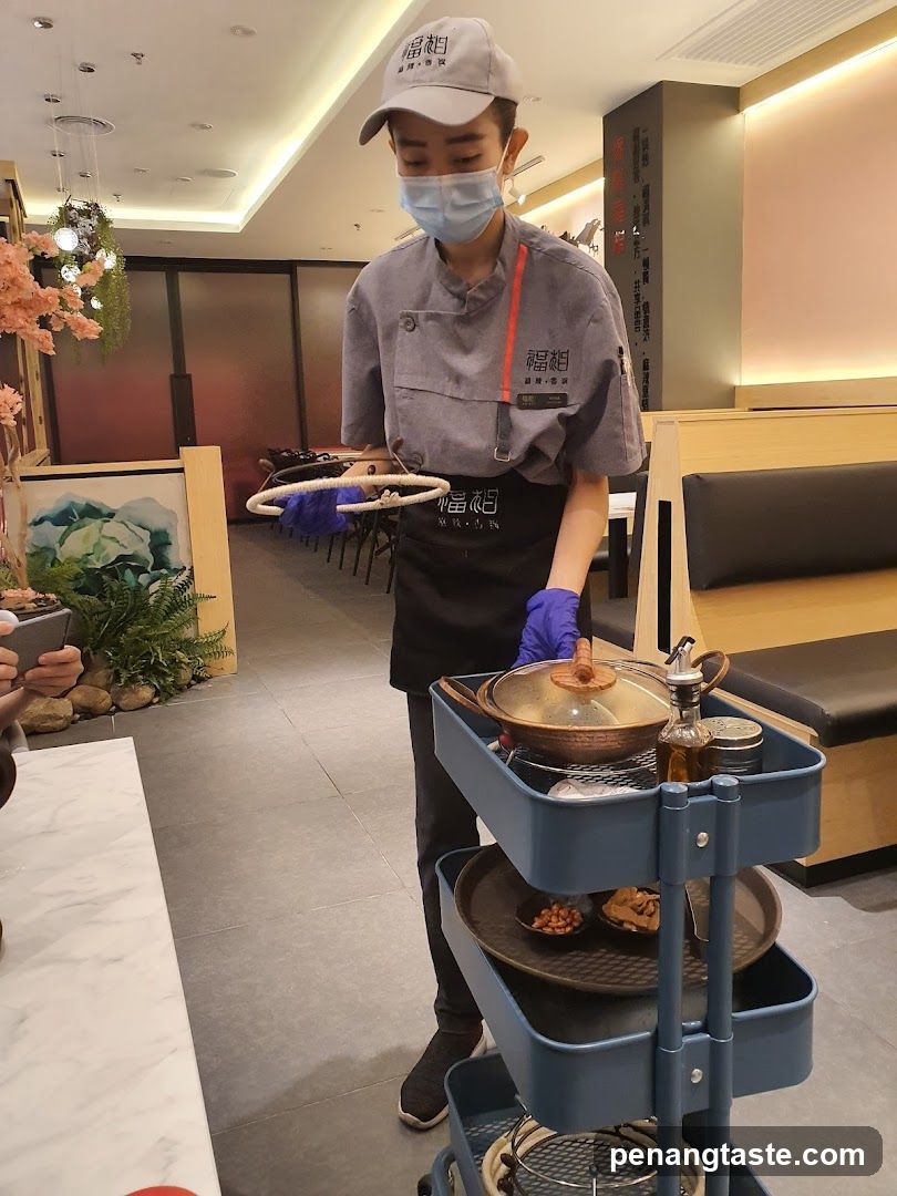 Server with a cart in a restaurant