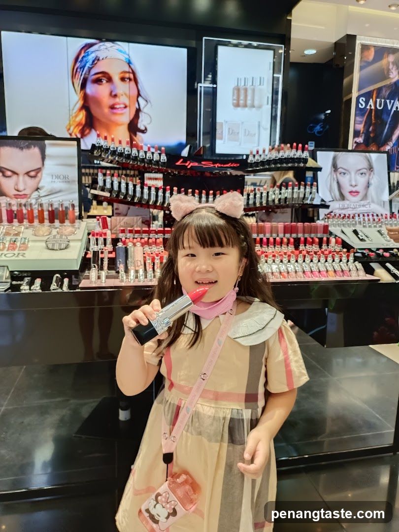 Young Girl Posing with Lipstick