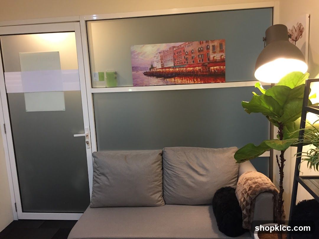 Waiting area with artwork and plant