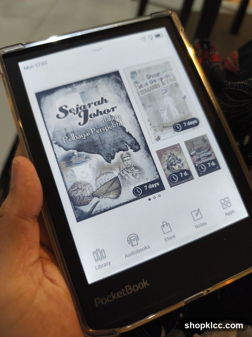 E-reader displaying book covers
