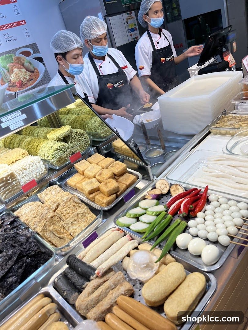 Food Stall Staff Preparing Ingredients