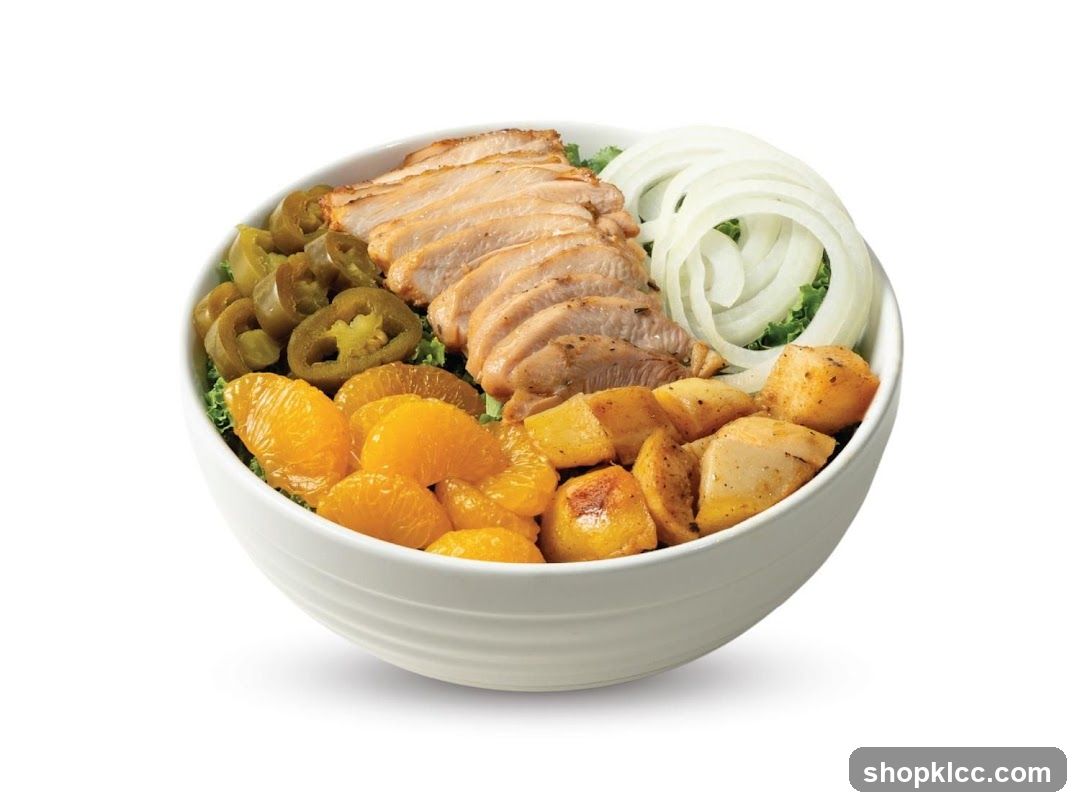 Bowl of Chicken Salad with Fruits and Vegetables