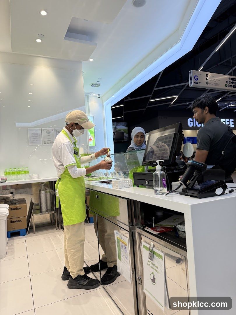 Staff serving customers at a counter