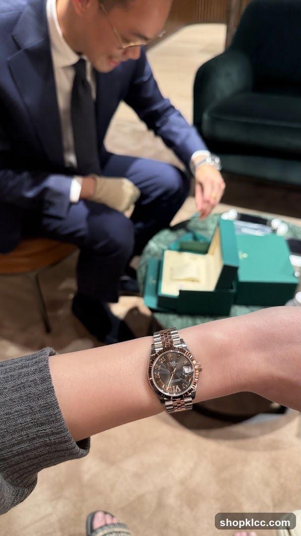 Person trying on a Rolex watch