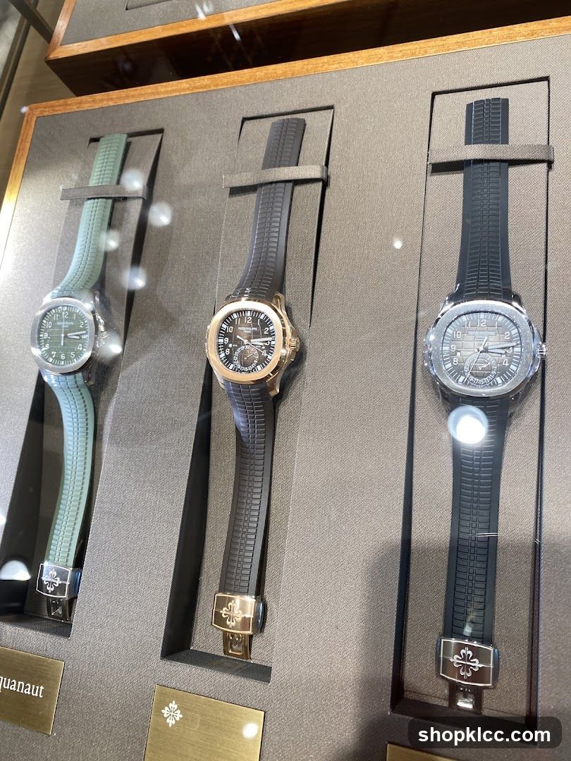 Three luxury watches on display
