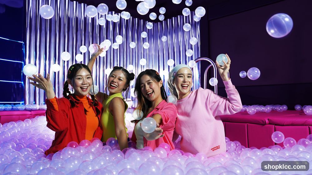 Four young women in a ball pit