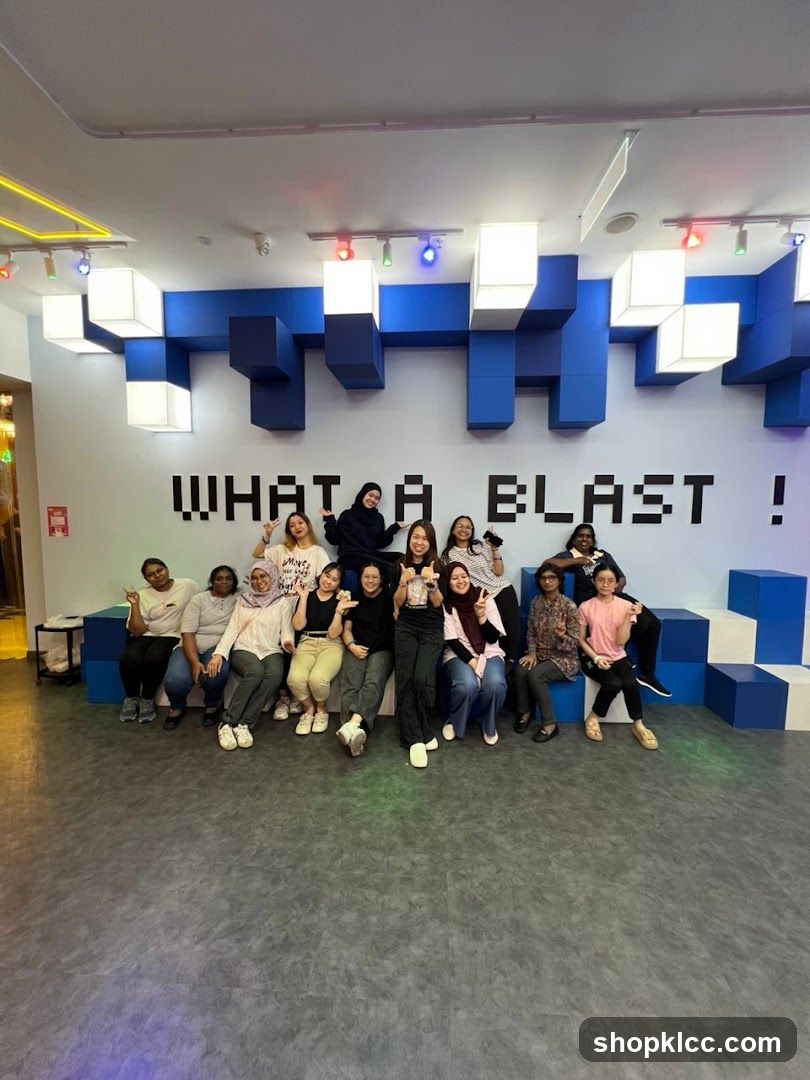 Group Posing in Front of Pixelated Wall Art