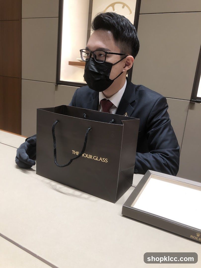 Sales Associate with Shopping Bag