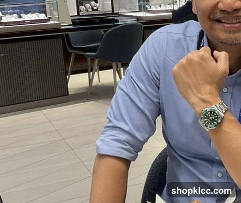 Man wearing a watch in a store