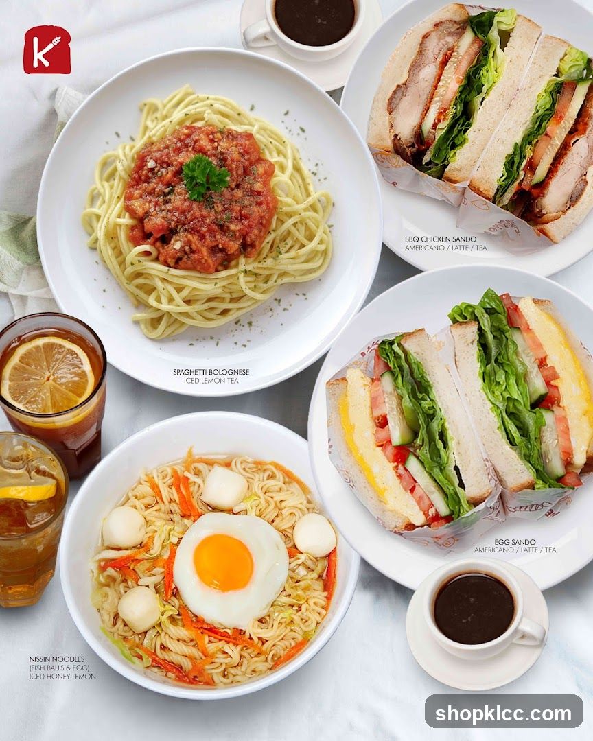 Food spread with noodles, sandwiches, and drinks