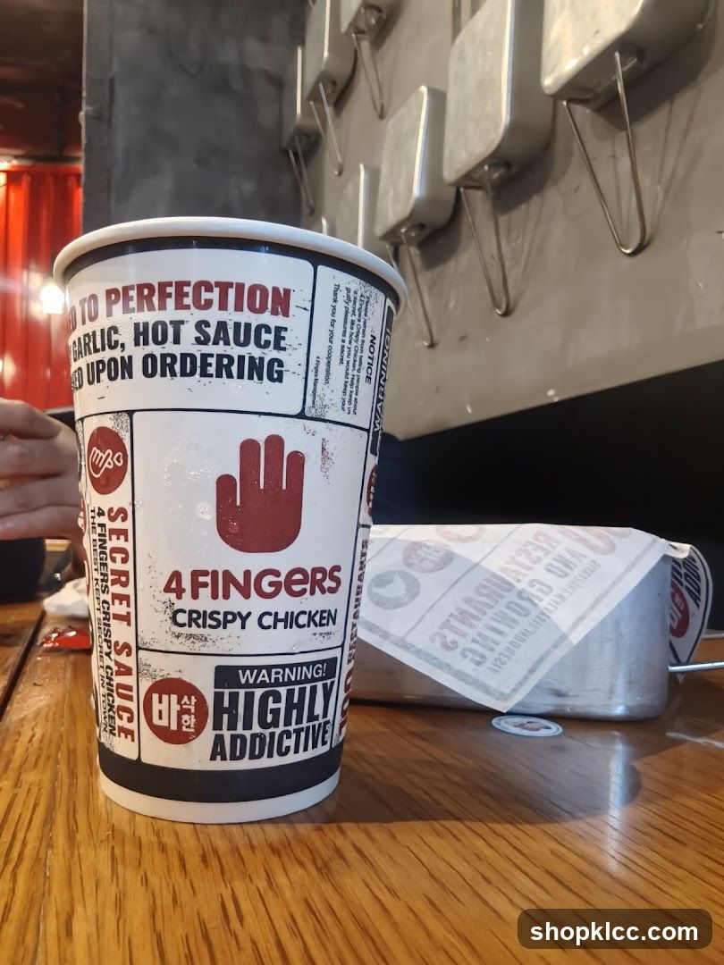 Cup with 4 Fingers Crispy Chicken branding