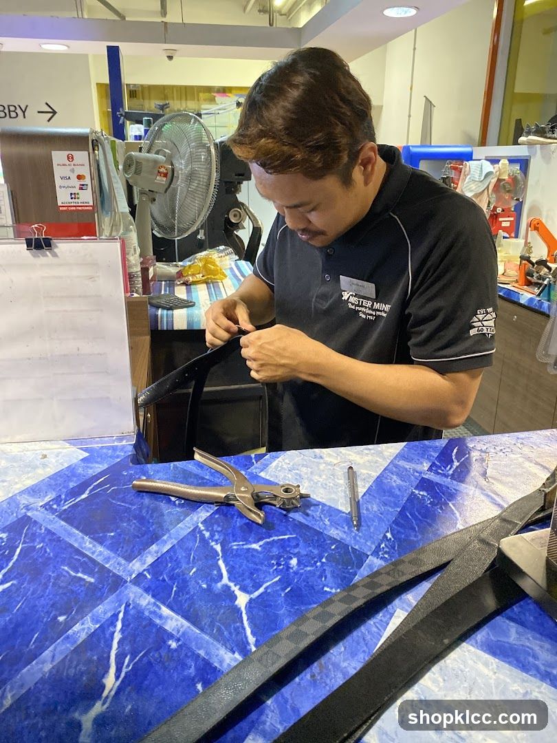 Man repairing a belt
