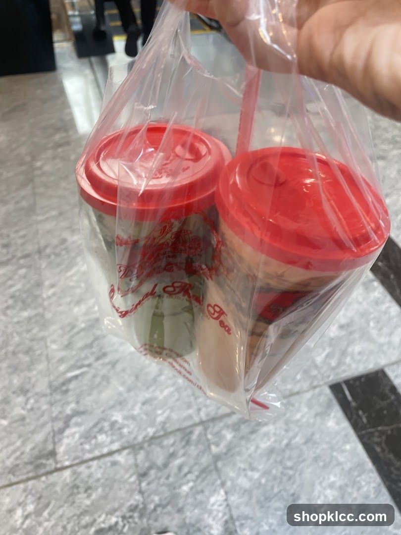 Two drinks in a plastic bag