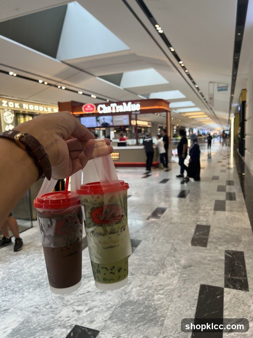 Two drinks in plastic bags