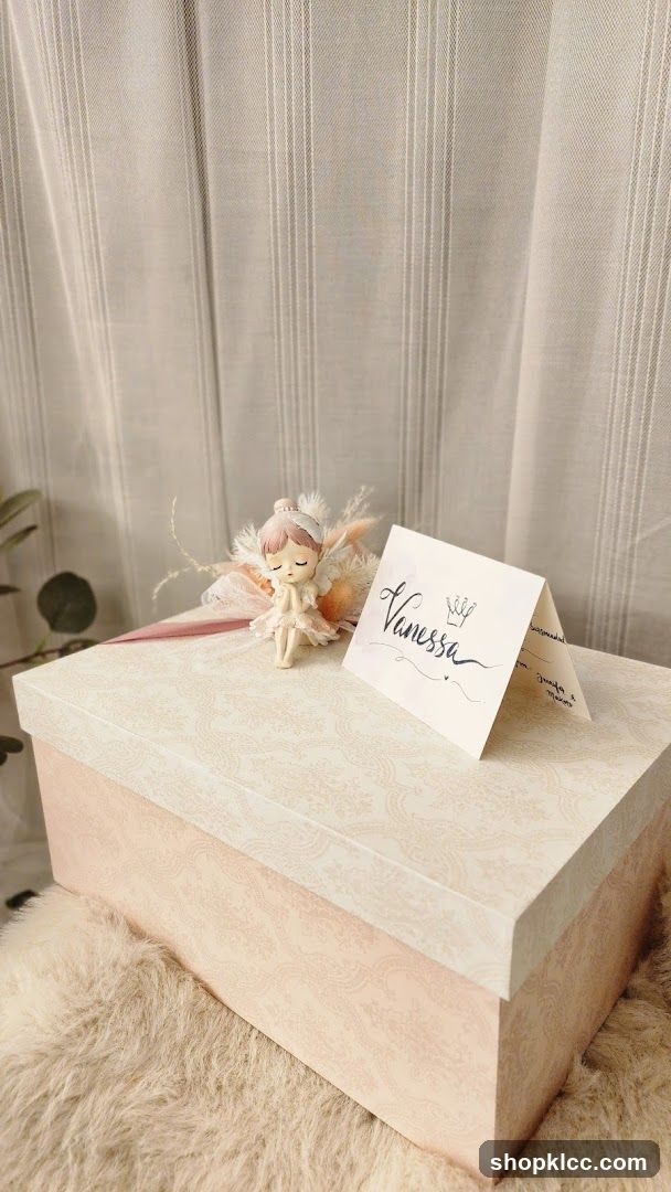 Gift box with fairy figurine and name card