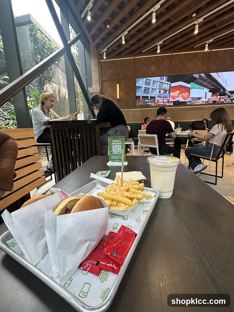Diners Enjoying Food in a Modern Restaurant