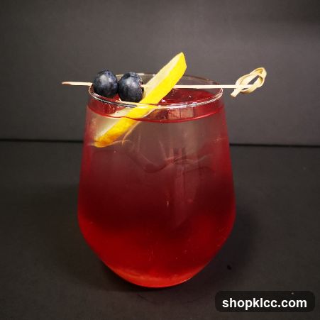 Cocktail with Berries and Lemon