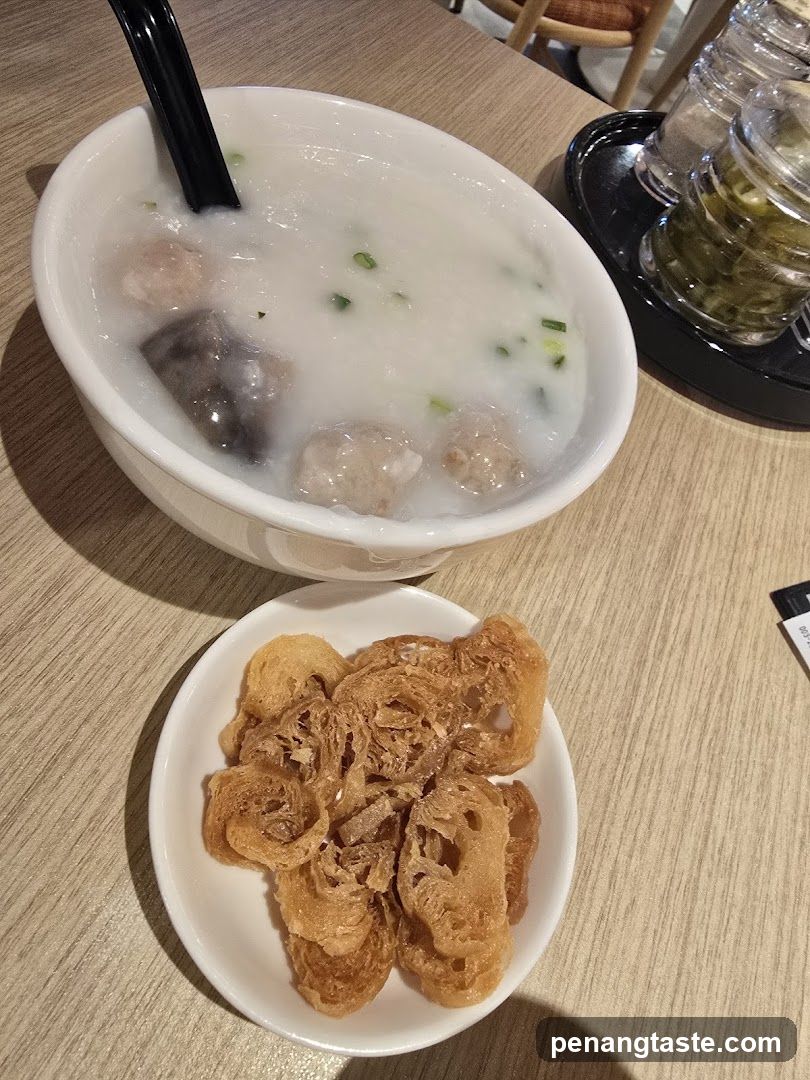 Congee with Meatballs and Fried Dough Sticks