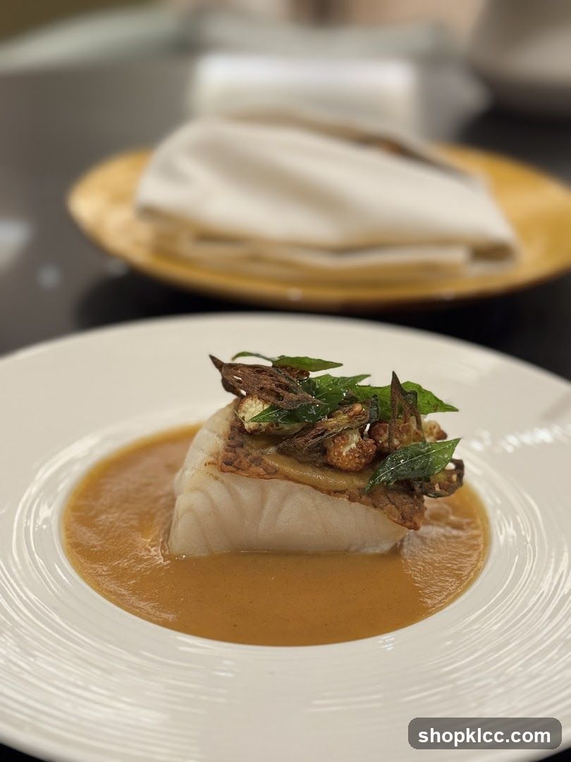 Fish dish with sauce and garnish