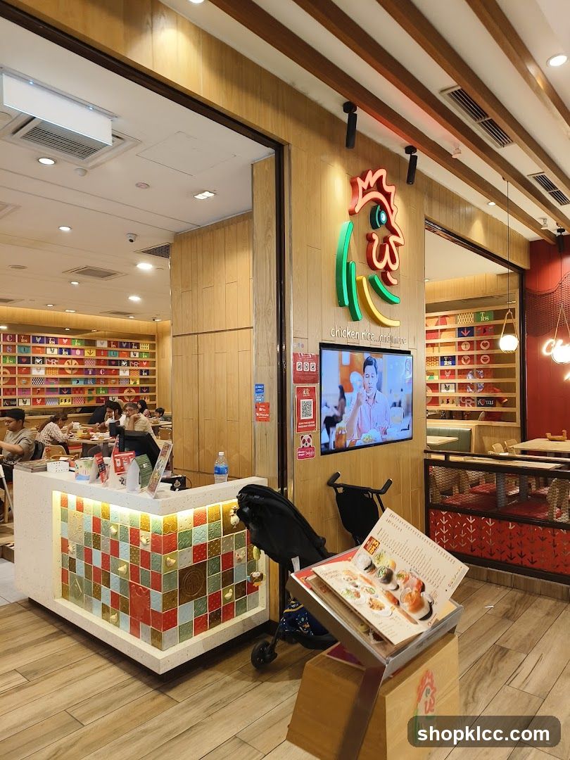 Restaurant Interior with Chicken Logo and Menu