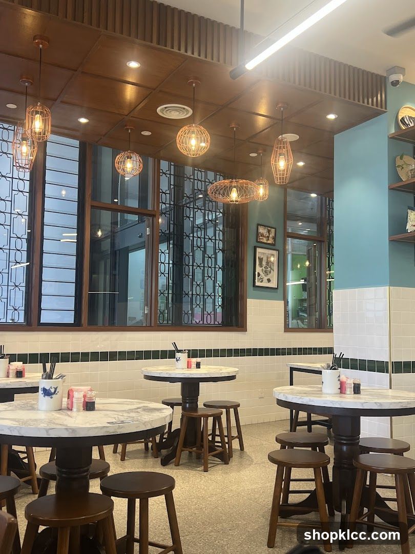 Restaurant Interior with Round Tables and Stools