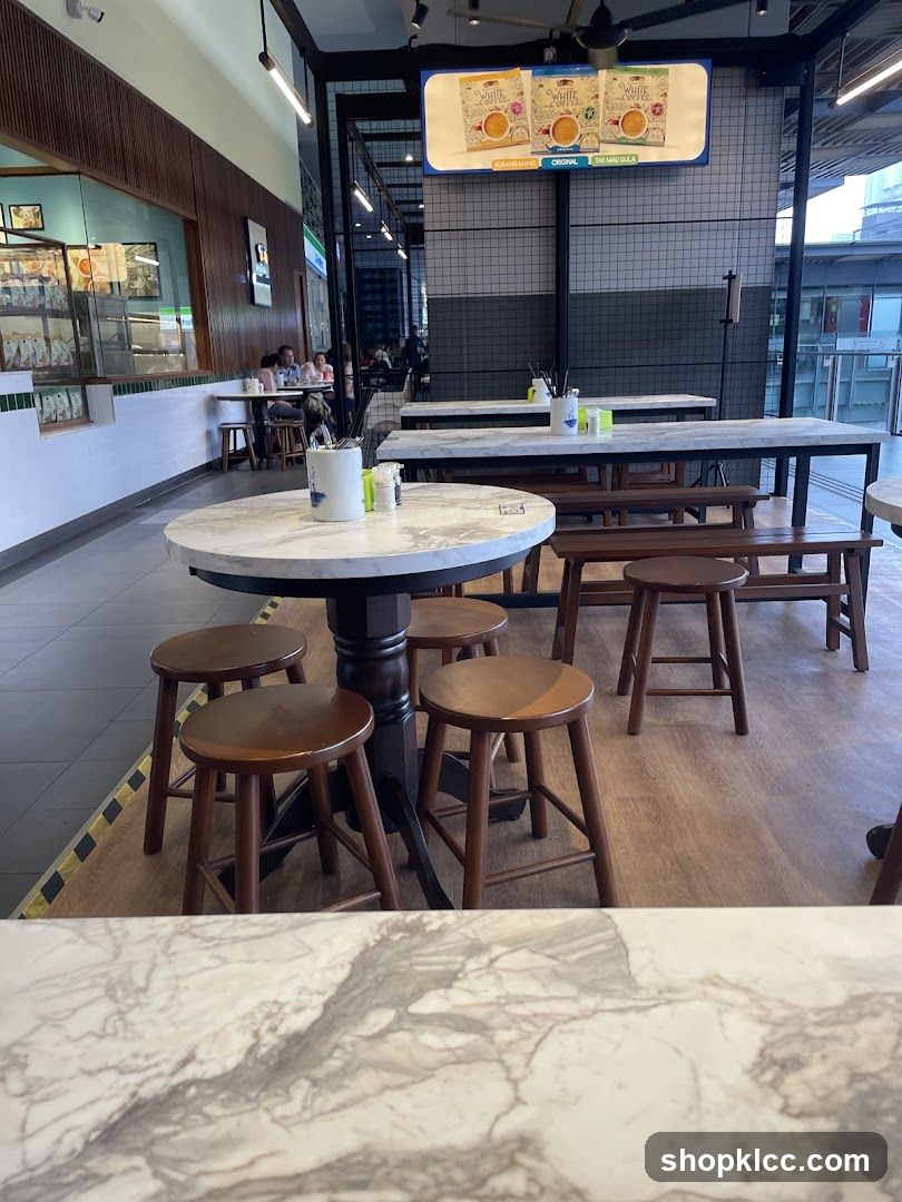 Cafe Interior with White Coffee Advertisement