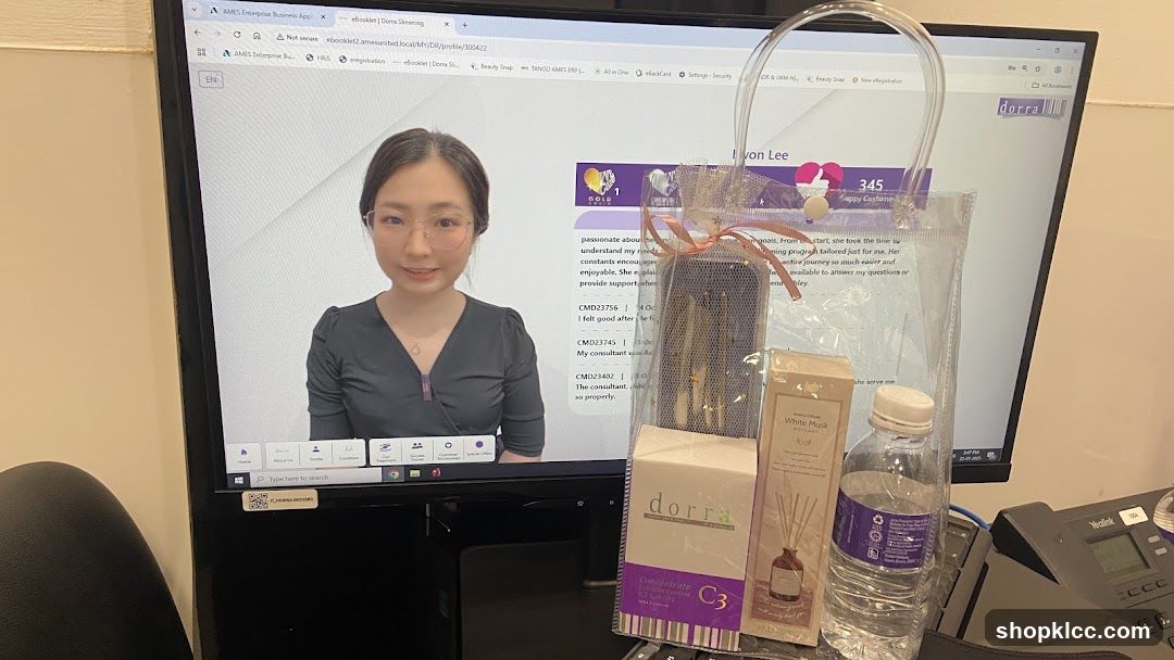 Computer screen with woman's profile and gift bag