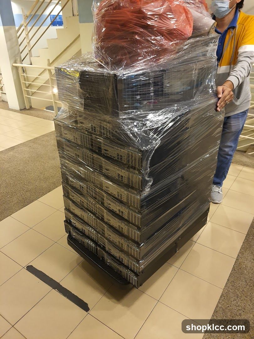 Person moving stacked servers