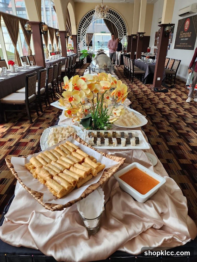 Buffet Spread with Spring Rolls and Sushi