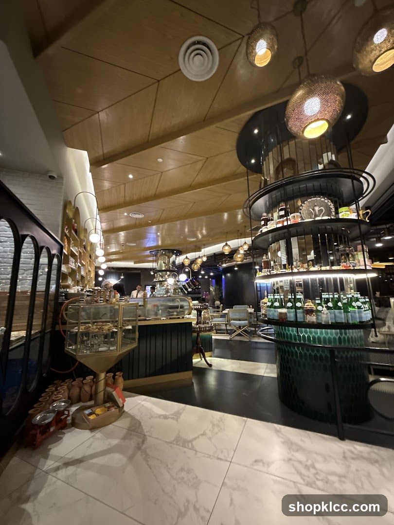 Interior of a cafe with display shelves and seating