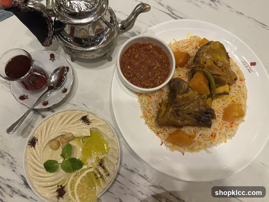 Lamb dish with rice and hummus