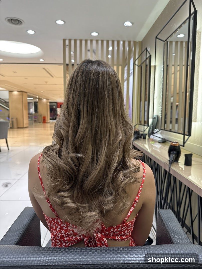 Woman with styled hair in salon