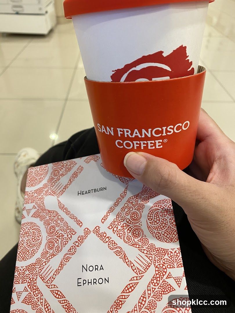 Coffee cup and book