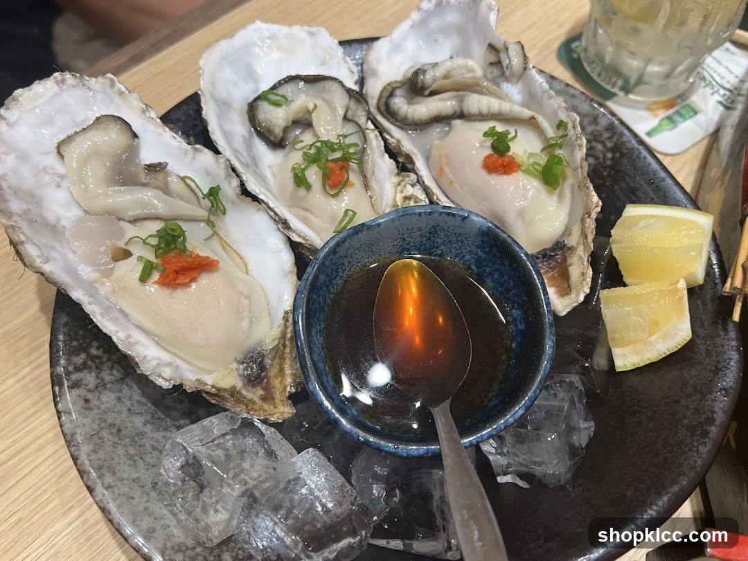 Oysters with Dipping Sauce and Lemon