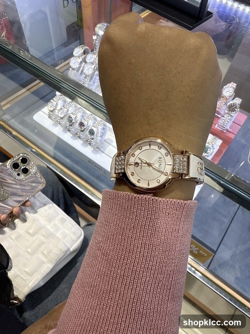 Woman wearing a watch in a store